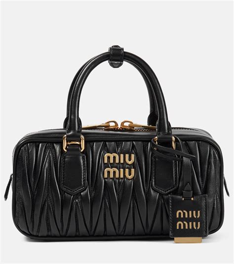 miu miu distressed bag|Miu Miu Distressed Leather Handle Bag .